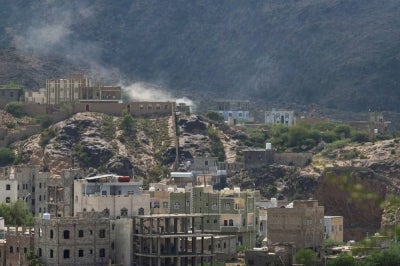 Smoke billows from a site that was targeted during battles between Saudi-backed Yemeni government fighters and Yemen's Iran-backed Houthis at the Jabal Han front west of the city of Taiz on Oct 21, 2026. - (Photo by AHMAD AL-BASHA / AFP)