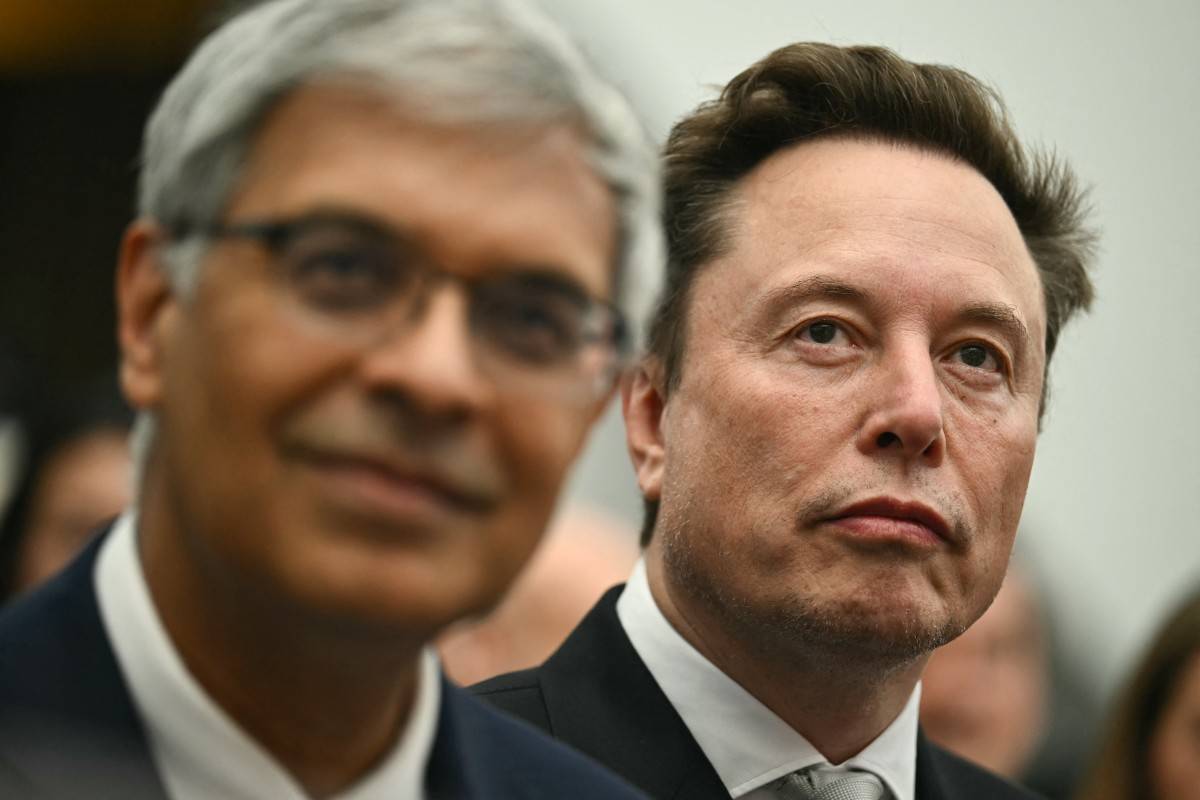The combination would be worth about $3.5 trillion and would be the largest corporate deal in history. Photo by AFP