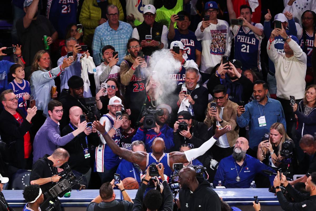 PHILADELPHIA, PA - OCTOBER 22: Lebron James #23 of the Philadelphia 76ers throws chalk in the air before the game against the Cleveland Cavaliers on October 22, 2026 at Xfinity Mobile Arena in Philadelphia, Pennsylvania NOTE TO USER: User expressly acknowledges and agrees that, by downloading and/or using this Photograph, user is consenting to the terms and conditions of the Getty Images License Agreement. Mandatory Copyright Notice: Copyright 2026 NBAE David L. Nemec/NBAE via Getty Images/AFP (Photo by David L. Nemec / NBAE / Getty Images / Getty Images via AFP)
