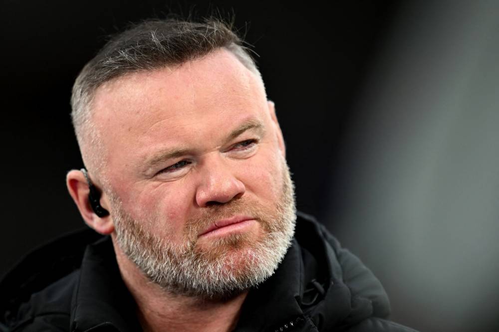 TV pundit and former footballer Wayne Rooney. (Photo by Paul ELLIS / AFP)