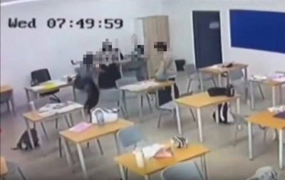 The suspect in the case involving a student who allegedly attacked a teacher at an international school here last Wednesday is still receiving treatment in hospital. Photo: Screenshot of viral social media video.