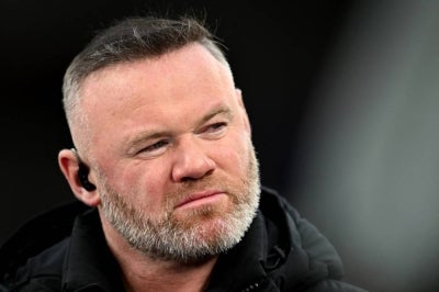 TV pundit and former footballer Wayne Rooney. (Photo by Paul ELLIS / AFP)