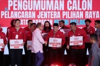 Prime Minister and Pakatan Harapan (PH) chairman Datuk Seri Anwar Ibrahim (third, left) shakes hands with PH candidates contesting in the 16th Melaka State Election during the PH Candidate Announcement and Election Machinery Launch Ceremony at the Hang Jebat Stadium last night.
-- fotoBERNAMA (2026) COPYRIGHT RESERVED