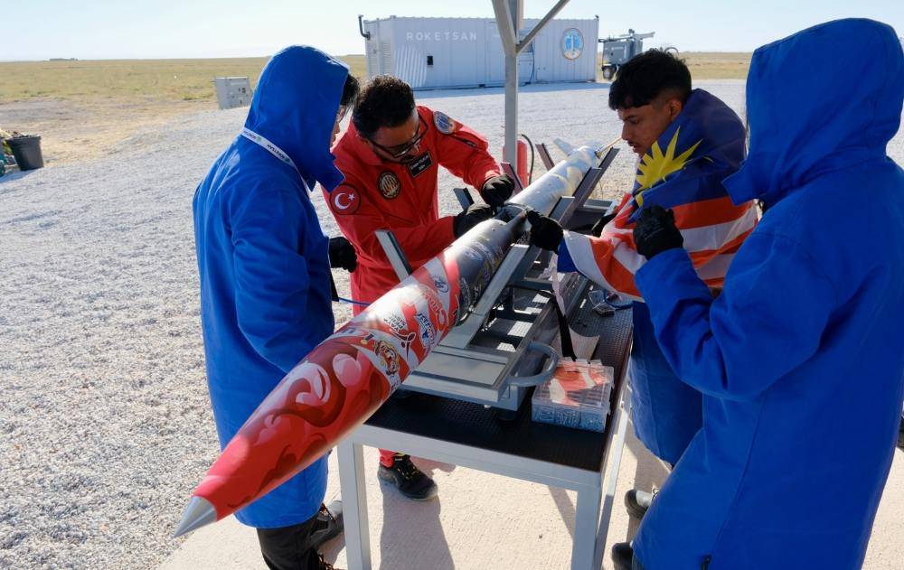 Members of UPM’s PUTRA-2 team inspect their rocket during the TeknoFest Turkiye 2026 Rocket Competition in Aksaray. -Photo: Putra Space Club UPM