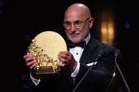 Spain head coach Luis de La Fuente on stage after winning the Trophy for the Men's Coach of the Year during the 2026 Ballon d'Or France Football award ceremony at the Palladium Theatre in London on October 26, 2026. (Photo by FRANCK FIFE / AFP)