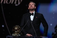 England and Bayern Munich forward Harry Kane reacts after receiving the Ballon d'Or award for the best male footballer during the 2026 Ballon d'Or France Football award ceremony at the Palladium Theatre in London on October 26, 2026. (Photo by FRANCK FIFE / AFP)