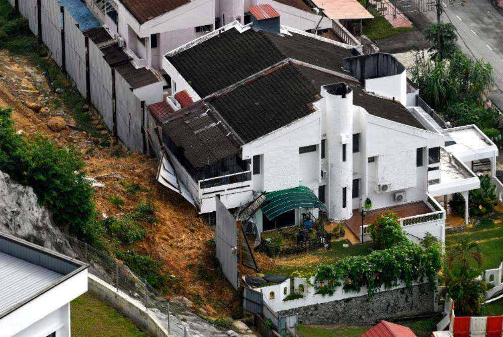 Hillside developments can remain vulnerable to landslides despite approved engineering plans, as heavy rainfall, poor drainage and inadequate slope maintenance can affect ground stability, experts warn following a fatal landslide in Paya Terubong, Penang. -Bernama Photo 
