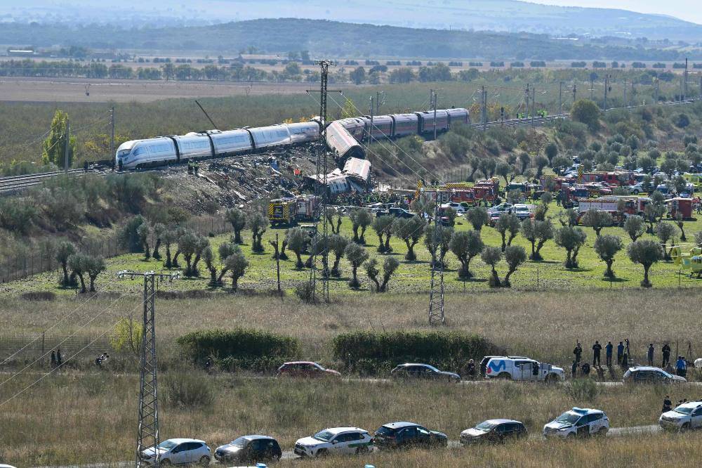 Emergency services work at the site of a train collision between a high speed Renfe AVE train and Iryo train around 150kms south of Madrid between Urda and Los Yebenes in the province of Toledo. Photo by AFP