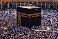 Deputy Haj and Umrah Minister Dahnil Anzar Simanjuntak has urged Indonesian umrah pilgrims to prioritise direct flights to Saudi Arabia over transit routes through Singapore and Malaysia, citing the potential to strengthen the country’s aviation industry. Photo: Edited via Canva
