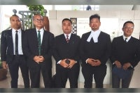 Kamal Hisham (second from right) with his legal team at the Sepang Magistrate’s Court on Oct 21.