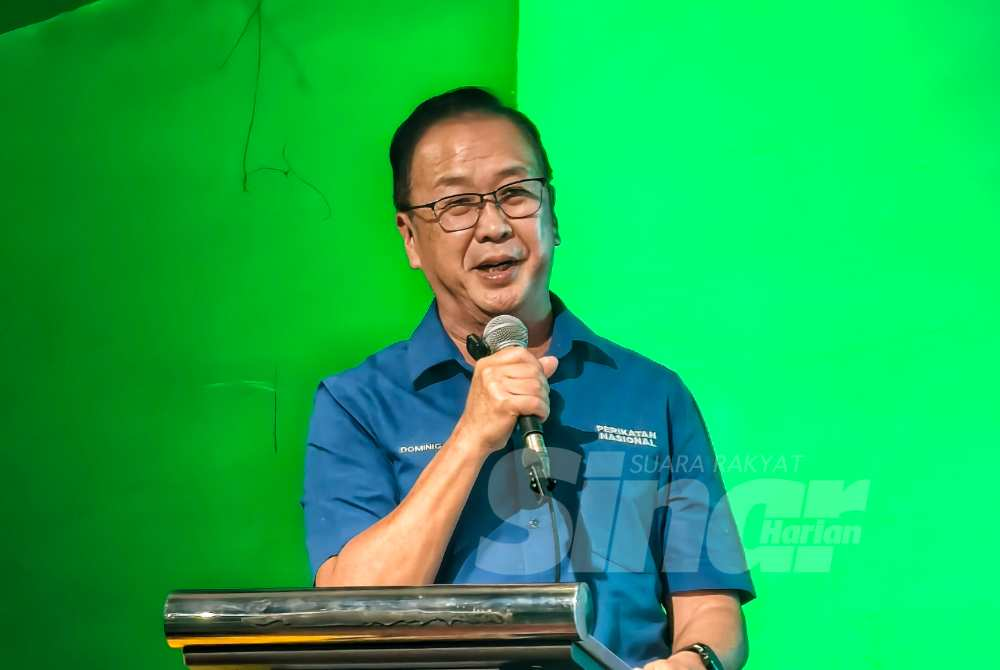 Dominic Lau speaking at the PN Melaka state election candidate announcement ceremony, last night.