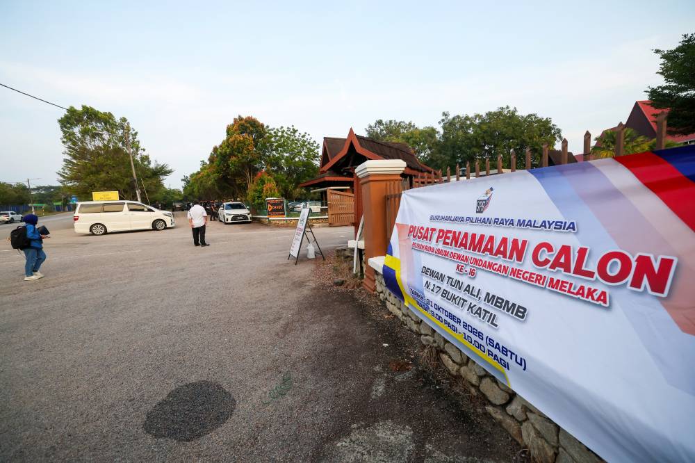 Election Commission (EC) personnel prepare for the nomination process for the 16th Melaka State Election, which begins at 9am at the Dewan Tun Ali Nomination Centre, Melaka Historic City Council (MBMB), Bukit Katil, today. - Photo by Bernama