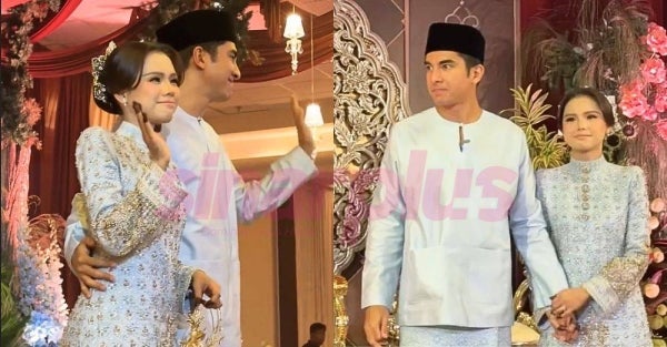 Pasangan mempelai menggayakan busana daripada pereka terkenal, Rizman Ruzaini (Foto: Tangkap layar video Team Saddiq)