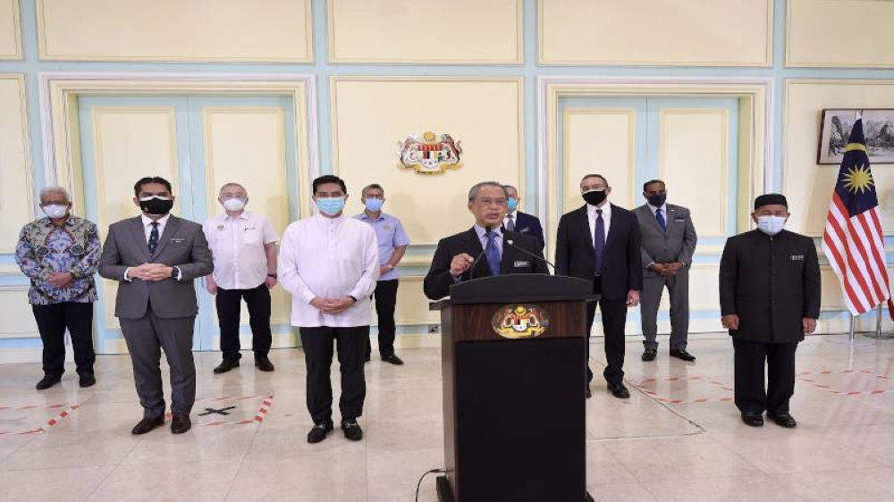 Perdana Menteri Tan Sri Muhyiddin Yassin (tengah) ketika menyampaikan Perutusan Khas di Bangunan Perdana Putra Jumaat lalu. - Foto Bernama