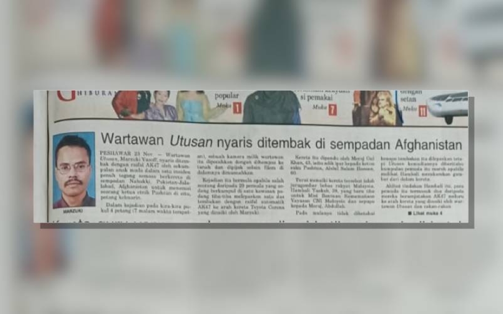 Berita yang disiarkan di muka depan Utusan Malaysia pada 24 November 2001.