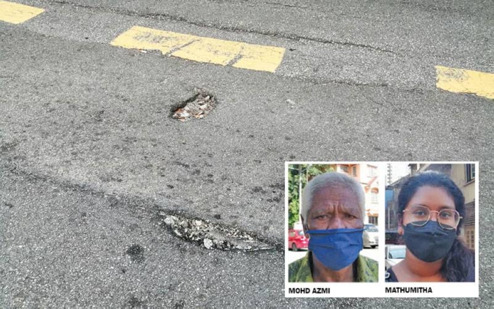 Jalan berlubang di Jalan Pahang berhampiran Hospital Kuala Lumpur yang belum dibaiki.