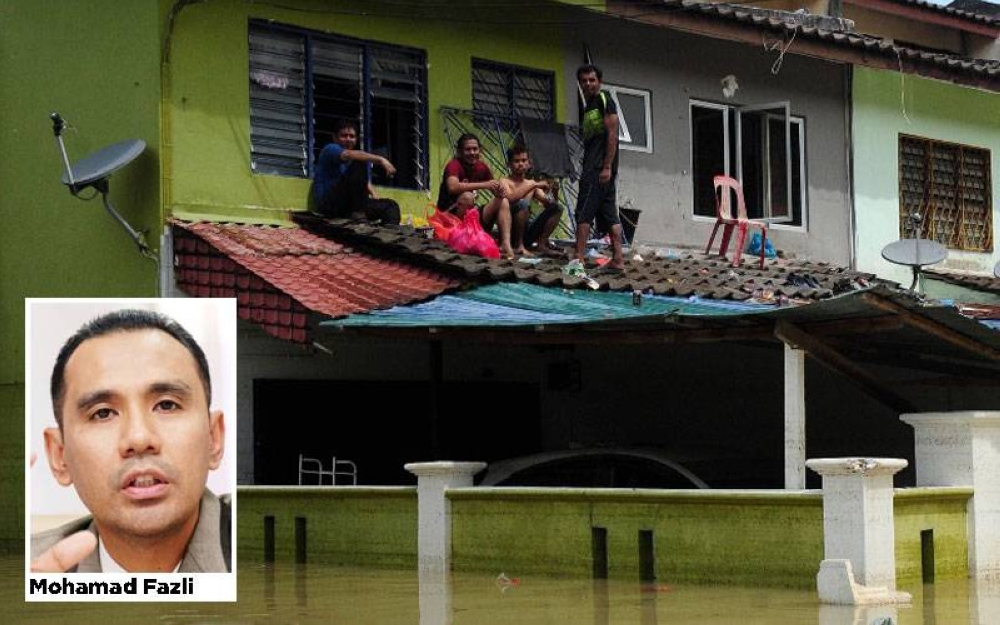 Mangsa banjir sudah cukup trauma ditambah lagi bebanan memikirkan rumah dan harta benda yang musnah akibat ditenggelami air.- Foto Bernama