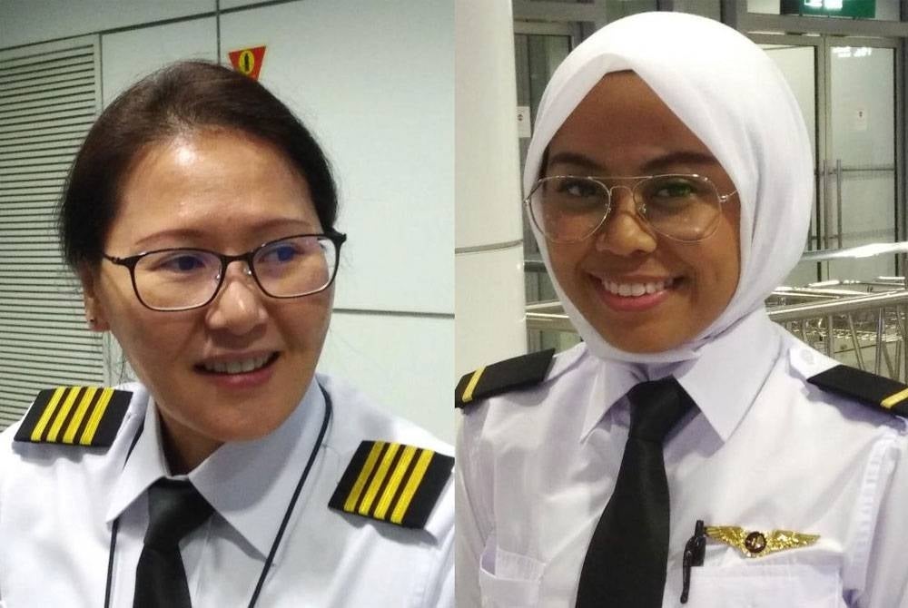 Pearl Wendy Mak (kiri) dan Nur Waie Hidayah Mohamad Rasidin antara dua juruterbang wanita terawal Malaysia Airlines.