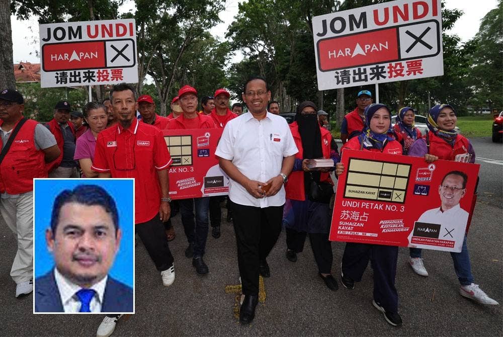 Suhaizan (tengah) hadir di Pasar Malam Taman Sutera untuk berkempen bagi PRK Parlimen Pulai baru-baru ini. Gambar kecil: Mohd Yusri