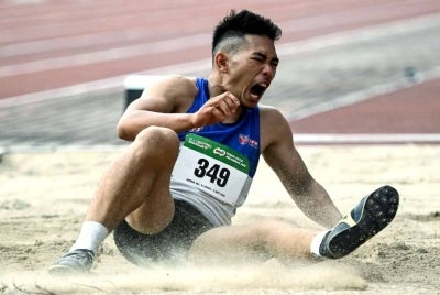 Andre Anura dalam acara Lompat Jauh Sukan Institusi Pendidikan Tinggi (SUKIPT) di Universiti Malaya. Foto Bernama