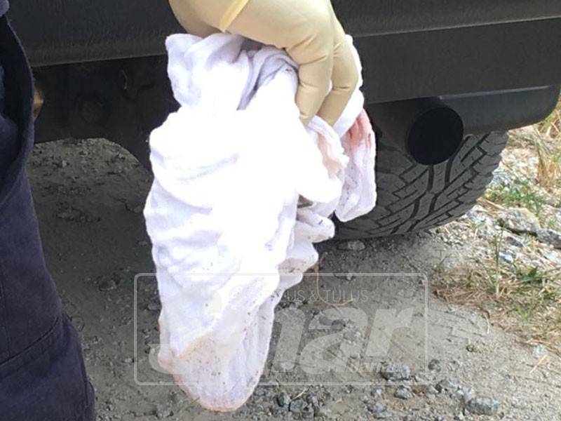 Bungkusan kain putih dipercayai janin bayi.