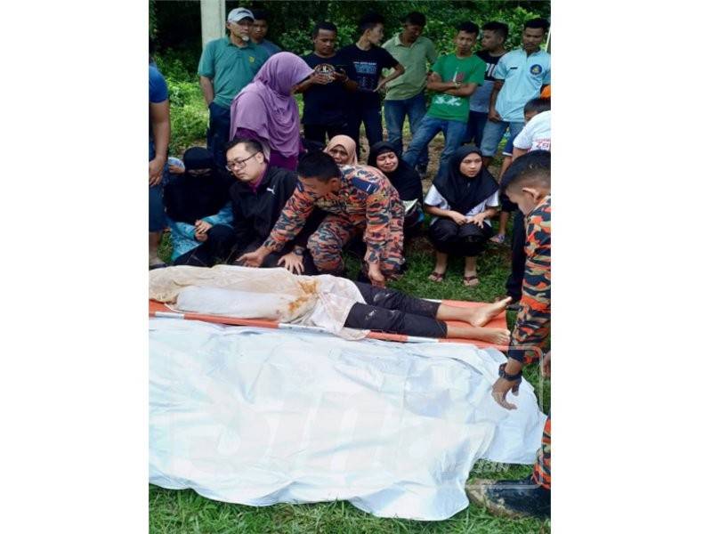 Mangsa dipercayai terjerlus ke dalam pasir ketika berkelah bersama keluarga di Sungai Pahang berhampiran Kampung Medang Hilir, di sini, pagi tadi.