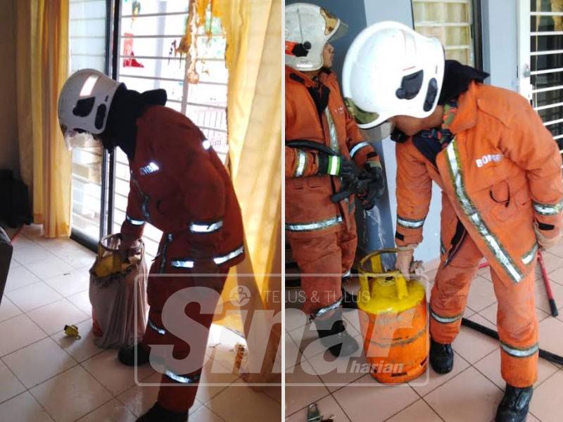 Anggota bomba dan penyelamat memeriksa tong gas yang digunakan lelaki terbabit.