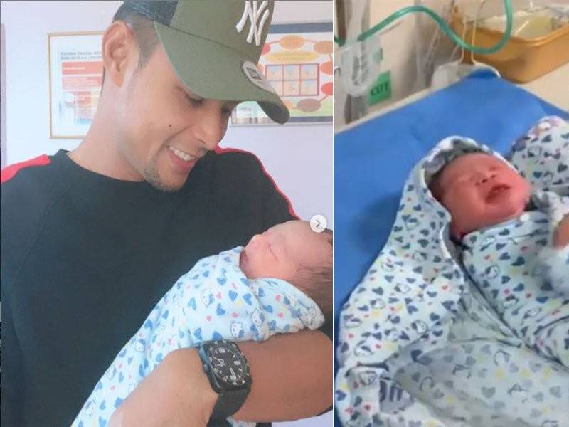 Zaquan bersama anak keempat