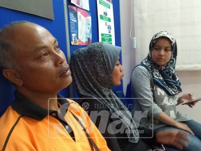 Supian kelihatan sugul bersama Norfarhana ketika ditemui di Jabatan Forensik HRPB.