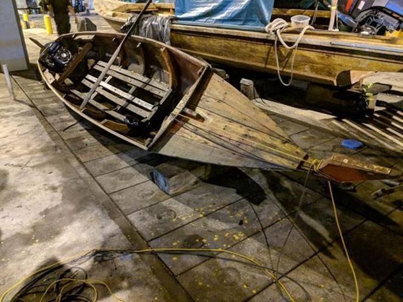 Kedua-dua lelaki itu cuba memasuki Singapura secara haram dengan sampan.