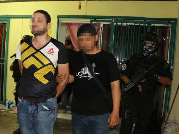 Antara suspek pengganas yang ditahan Bahagian Counter Terrorism Cawangan Khas PDRM. - Foto Ihsan PDRM