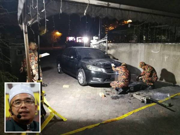 Pasukan forensik Bomba dari Perlis dan Putrajaya ketika melakukan siasatan terhadap kereta rasmi mufti Perlis yang terbakar. - Foto FB DrMAZA.com (Gambar kecil: Mohd Asri)