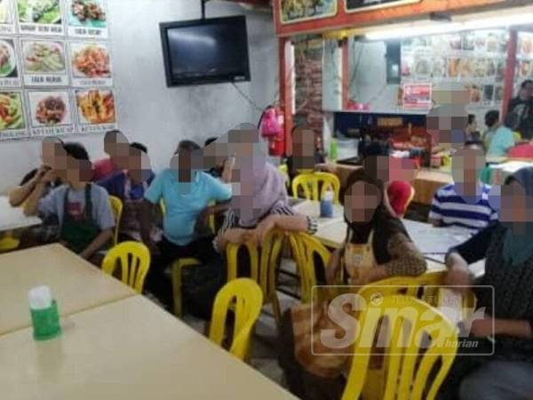 Antara PATI yang ditahan dalam Ops Selera di Kampung Baru, Kuala Lumpur, malam tadi.