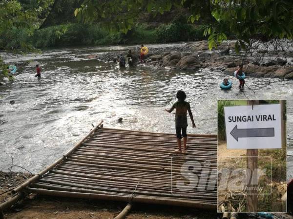 Pelantar buluh untuk pengunjung. (Gambar kecil: Papan tanda Sungai Viral.)