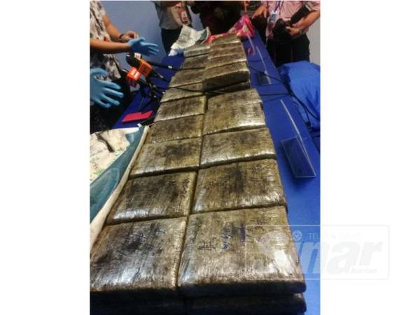 Sebanyak 50 ketulan ganja dirampas di Seri Kembangan, Selasa lalu.
