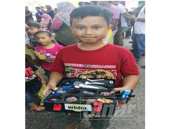 Peminat permainan beyblade, Faris Afhan.