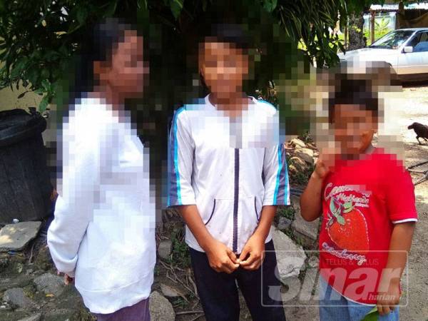 Azma (kiri) bersama adiknya Ali (tengah) dan Syairi benar-benar berhasrat mahu bersekolah.