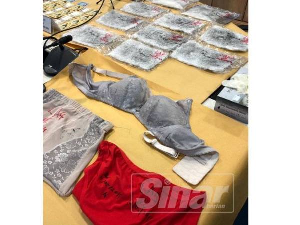 Antara dadah jenis syabu dan pakaian dalam yang dirampas susulan serbuan di sebuah hotel di Pandan Indah, Ampang Jaya, semalam.