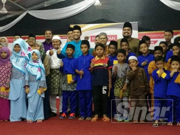 Hasnul Zulkarnain bersama anak-anak yatim serta asnaf.