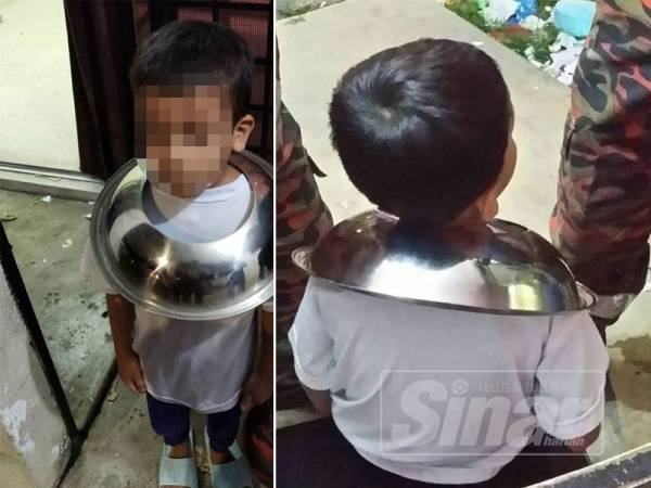 Anggota bomba terpaksa dihubungi bagi mengeluarkan kepala seorang kanak-kanak lelaki yang tersangkut dalam lubang periuk.