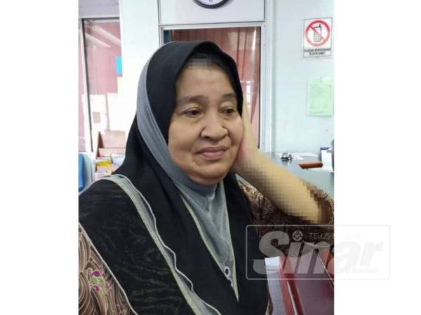 Latifah sayu memikirkan rumahnya yang rosak teruk akibat kemalangan kereta' terbang'.