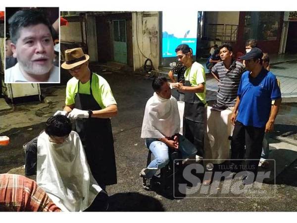 Golongan gelandangan menerima perkhidmatan gunting rambut secara percuma. (Gambar kecil: Mohd Azizan)