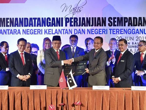 Memorandum persefahaman dan perjanjian sempadan berlangsung di Wisma Sumber Asli di sini hari ini. - FOTO BERNAMA