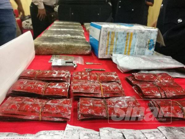 Antara rampasan dadah yang dirampas dalam serbuan di Kampung Baru, Kuala Lumpur, Khamis lalu.