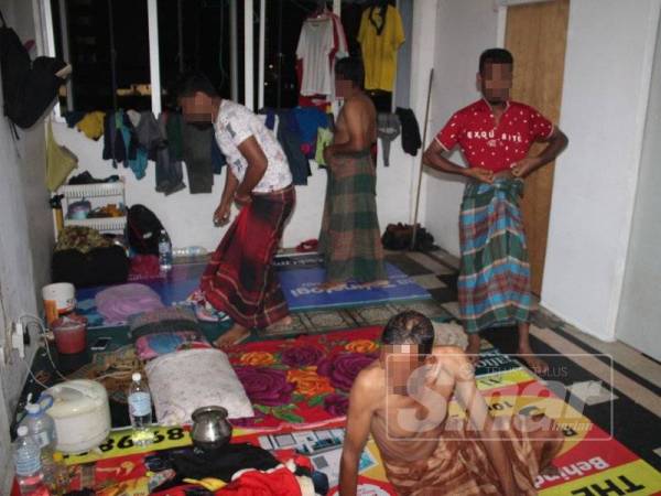 Antara warga asing yang ditahan dalam operasi bersepadu yang dilakukan Jabatan Imigresen Pulau Pinang semalam.