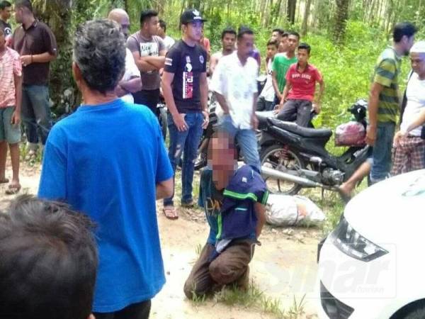 Foto pemuda disyaki pencuri getah sekerap yang cedera dipukul penduduk tular di laman sosial.