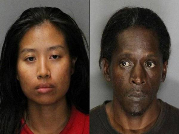 Angela Phakhin (kiri) dan tunangnya Untwan Smith mendakwa mahu menyingkirkan syaitan dari tubuh anak Phakhin berusia tiga tahun. - Foto AFP