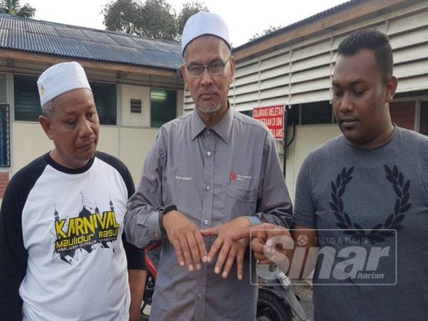 Wan Hasaan mengalami luka di kedua-dua belah tangan dan betis kirinya selepas bergelut dengan suspek.