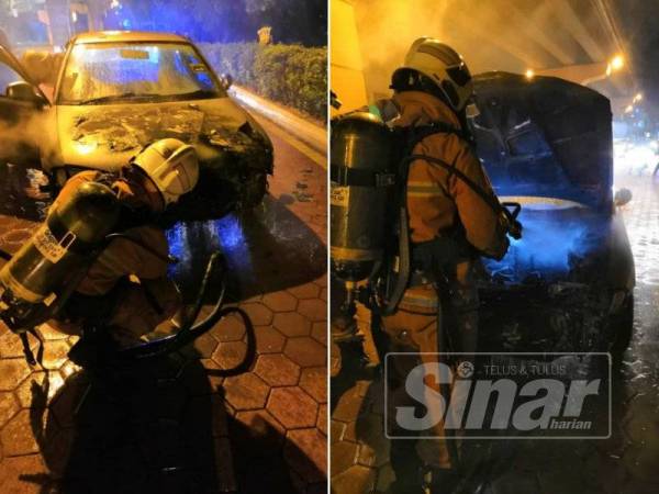 Anggota bomba membantu memadamkan kebakaran melibatkan sebuah kereta di PJS 9 di sini awal pagi tadi.