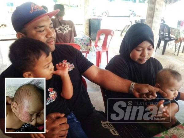 Megat Zarulfais dan Norfarahana bersama dua anak mereka, Megat Muhammad Kays (kanan) dan Megat Mohd Khalif ketika ditemui Sinar Harian.